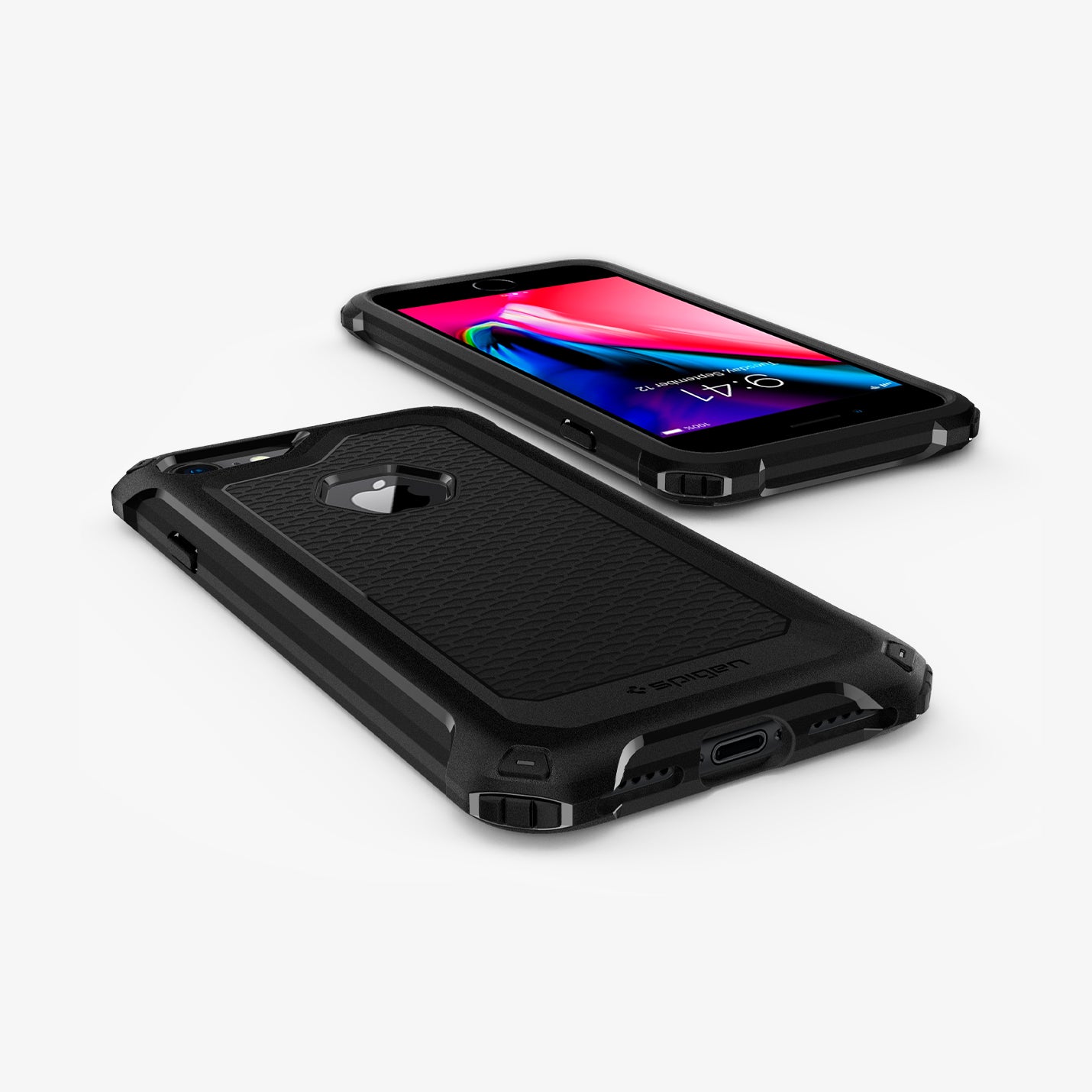 042CS21491 - iPhone 8 Case Rugged Armor Extra in Black showing the back and front of 2 devices showing partial sides, top and bottom on a flat surface
