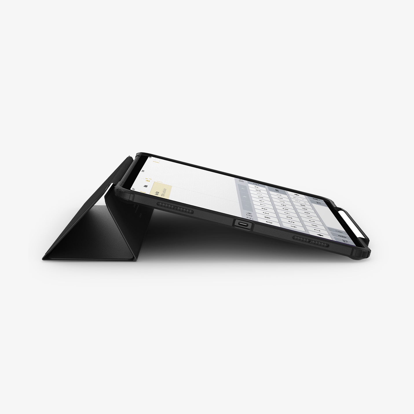 ACS07668 - iPad Air 12.9-inch Case Ultra Hybrid Pro in Black showing the bottom and partial front with device propped up by built in kickstand with s-pen attached