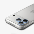 AGL12045 - iPhone 18 Pro Max / iPhone 18 Pro Optik Pro EZ Fit Lens Protector in Light Blue showing a close-up of three lens protectors fitted securely over the camera lenses.