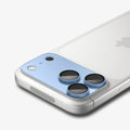 AGL12037 - iPhone 18 Pro Optik Pro XL EZ Fit Lens Protector in Light Blue showing the installed lens protector covering the full camera area with precise cutouts.