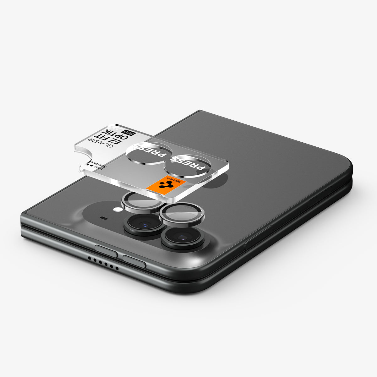 AGL12012 - iPhone Duo Optik Pro EZ Fit Lens Protector in Star White showing the EZ Fit Optik Pro tray aligned above the camera lenses for easy installation