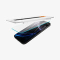 AGL07928 - iPhone 16 Pro GLAS.tR EZ Fit Sensor Protected showing the installation tray partially hovering above the screen protector and the device
