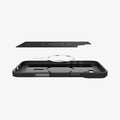 ACS08221 - iPhone 16 Case Core Armor (MagFit) in Matte Black showing the detached  soft inner layer hovering above the metal ring plate and the case