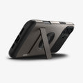ACS08226 - iPhone 16 Case Slim Armor (MagFit) in Gunmetal showing the back, partial side and bottom, propped up with a built-in kickstand