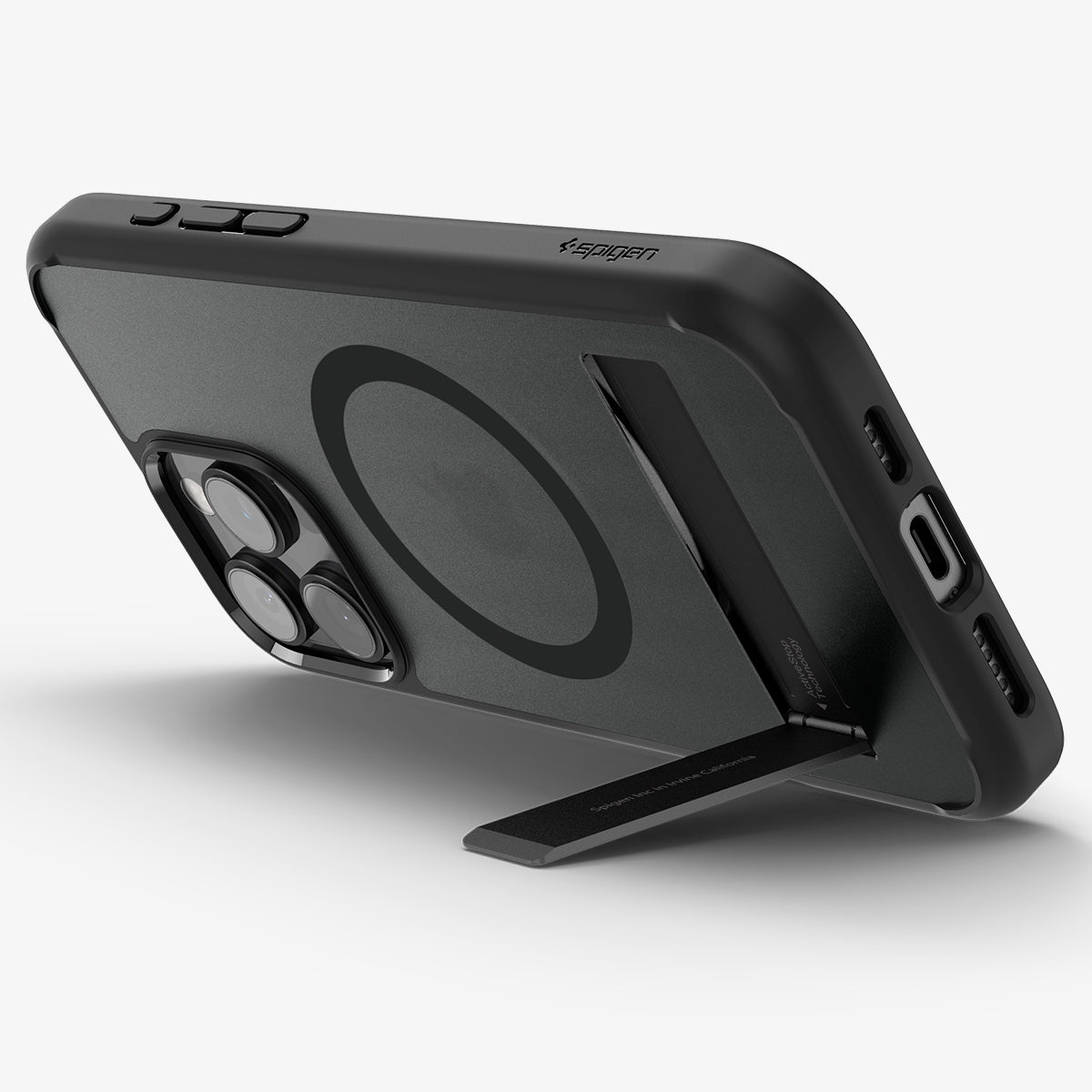 ACS08379 - iPhone 16 Pro Case Ultra Hybrid S (MagFit) in Frost Black showing the back, partial sides and bottom, propped up with a built-in kickstand
