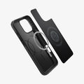 ACS08106 - iPhone 16 Pro Case Thin Fit (MagFit) in Black showing the inner layer hovering from detached magnet ring plate and the case