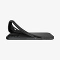ACS09977 - iPhone 17 Liquid Air in Matte Black showing the back, partially peeled off from the device on a flat surface