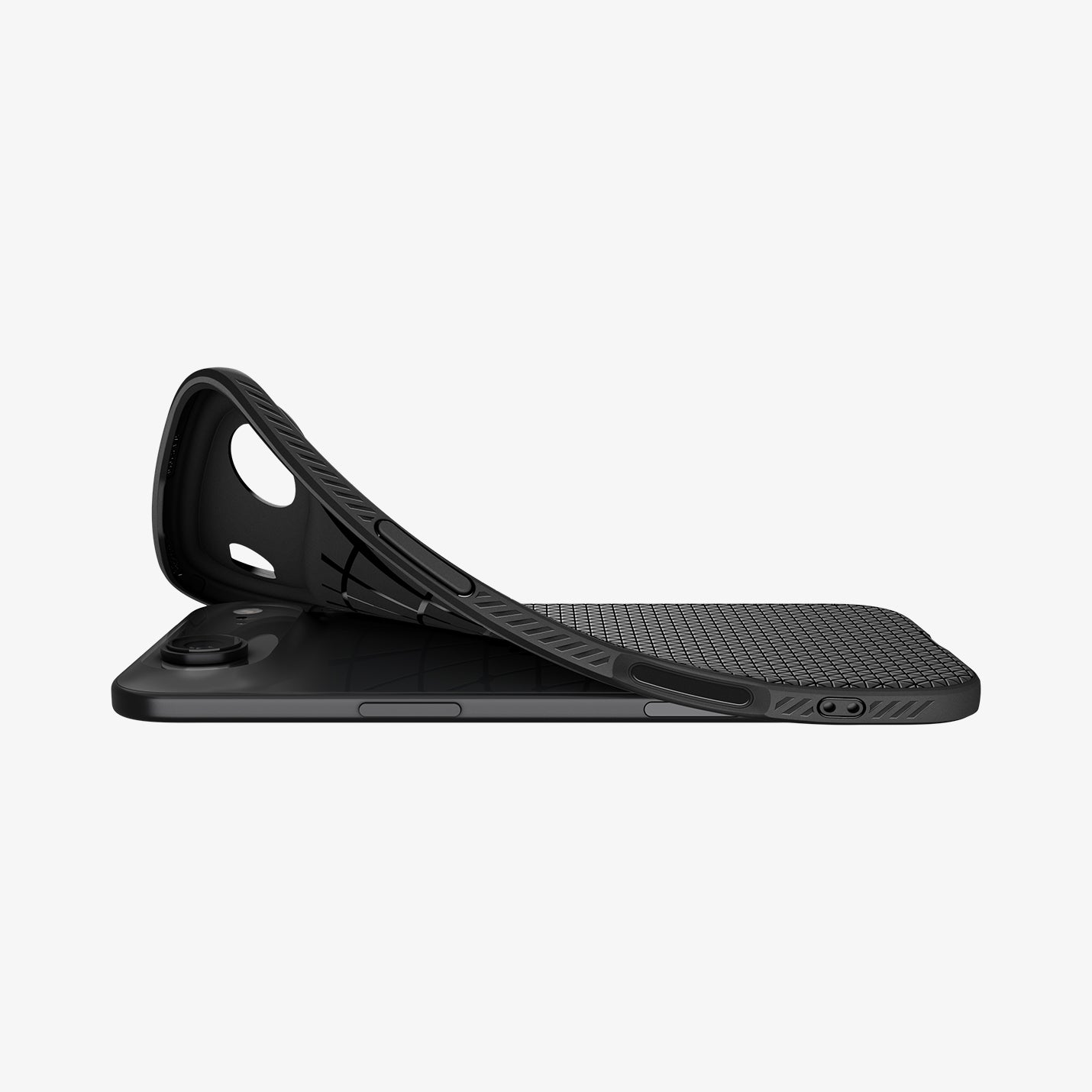 ACS09922 - iPhone 17 Air Liquid Air in Matte Black showing the back, partially peeled off from the device on a flat surface