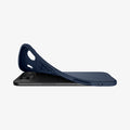 ACS09923 - iPhone 17 Air Liquid Air in Navy Blue showing the back, partially peeled off from the device on a flat surface