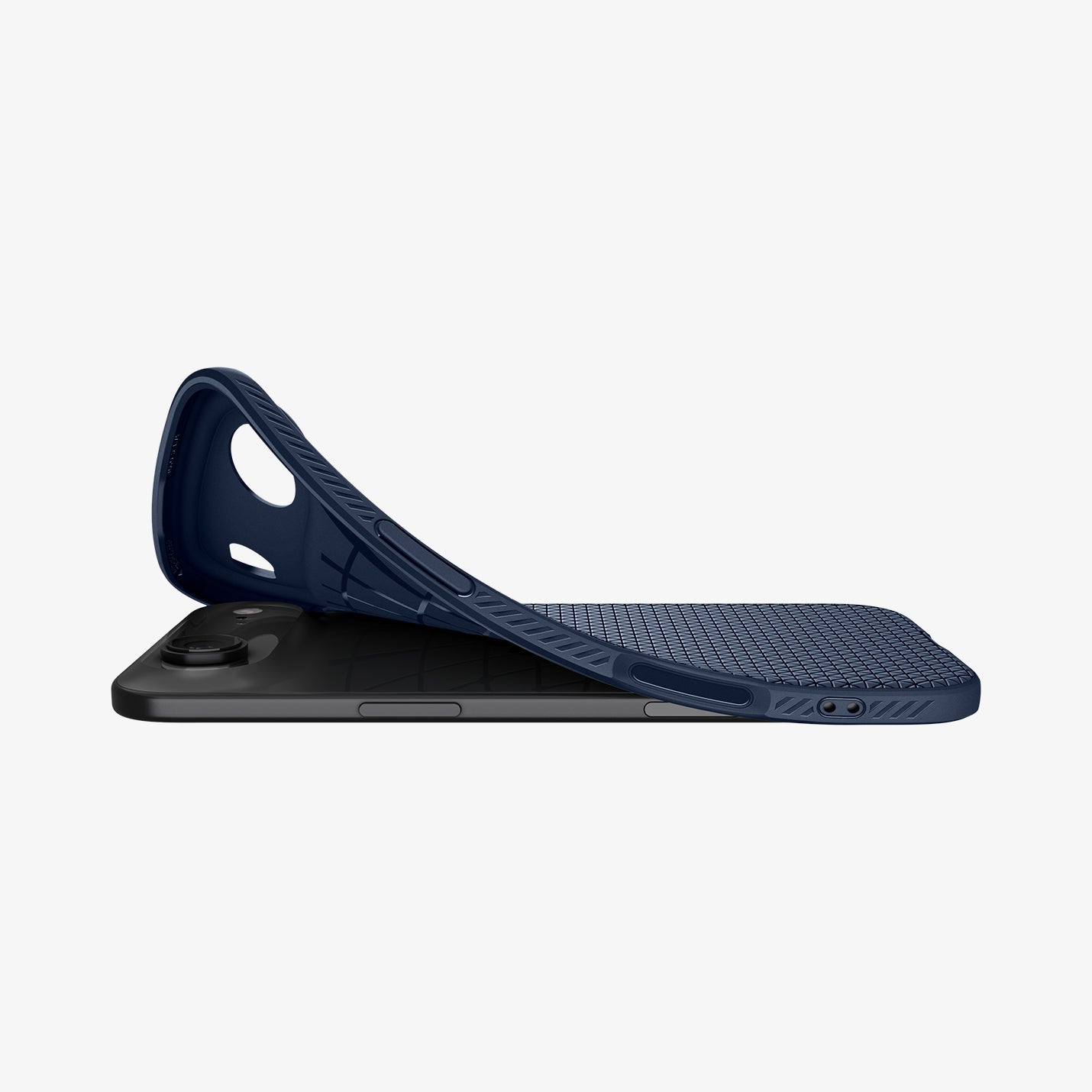ACS09923 - iPhone 17 Air Liquid Air in Navy Blue showing the back, partially peeled off from the device on a flat surface