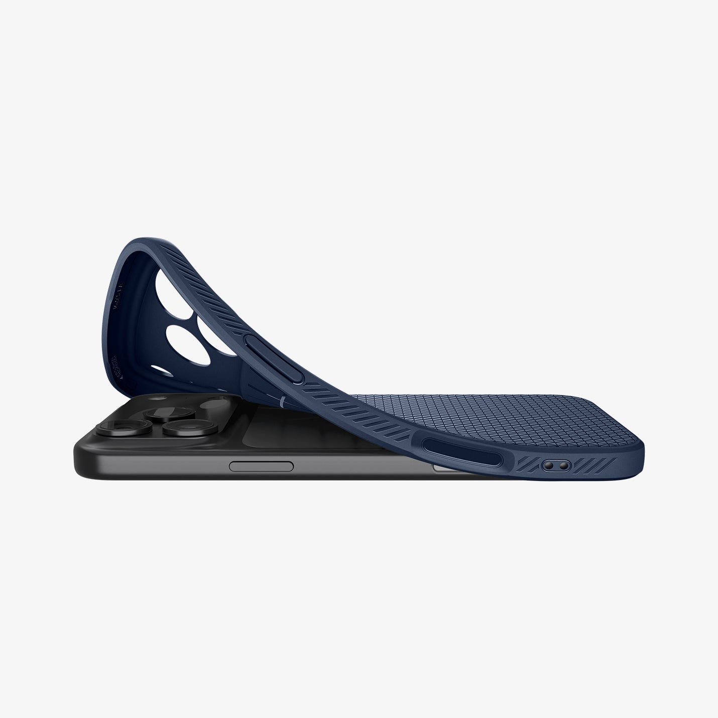 ACS09943 - iPhone 17 Pro Liquid Air in Navy Blue showing the back, partially peeled off from the device on a flat surface