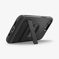 ACS09129 - iPhone 16e Case Slim Armor (MagFit) in Black showing the back, partial side and bottom propped up with the built-in kickstand