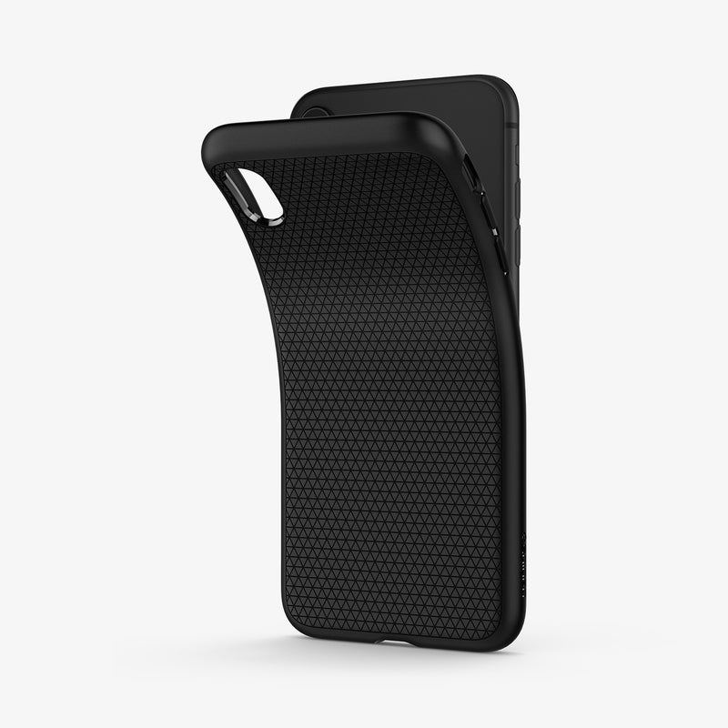 064CS24872 - iPhone XR Case Liquid Air in Black showing the back of soft tpu back case partially peeled from behind a device