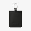 AFA03754 - showing the back of a textured pouch with a metal carabiner clip, stitched attachment strip, and logo patch.