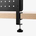AHP11400 - Clamp Pegboard | LD405 showing close up of clamp bracket secured to wooden desk edge with pegboard panel above and star knob below