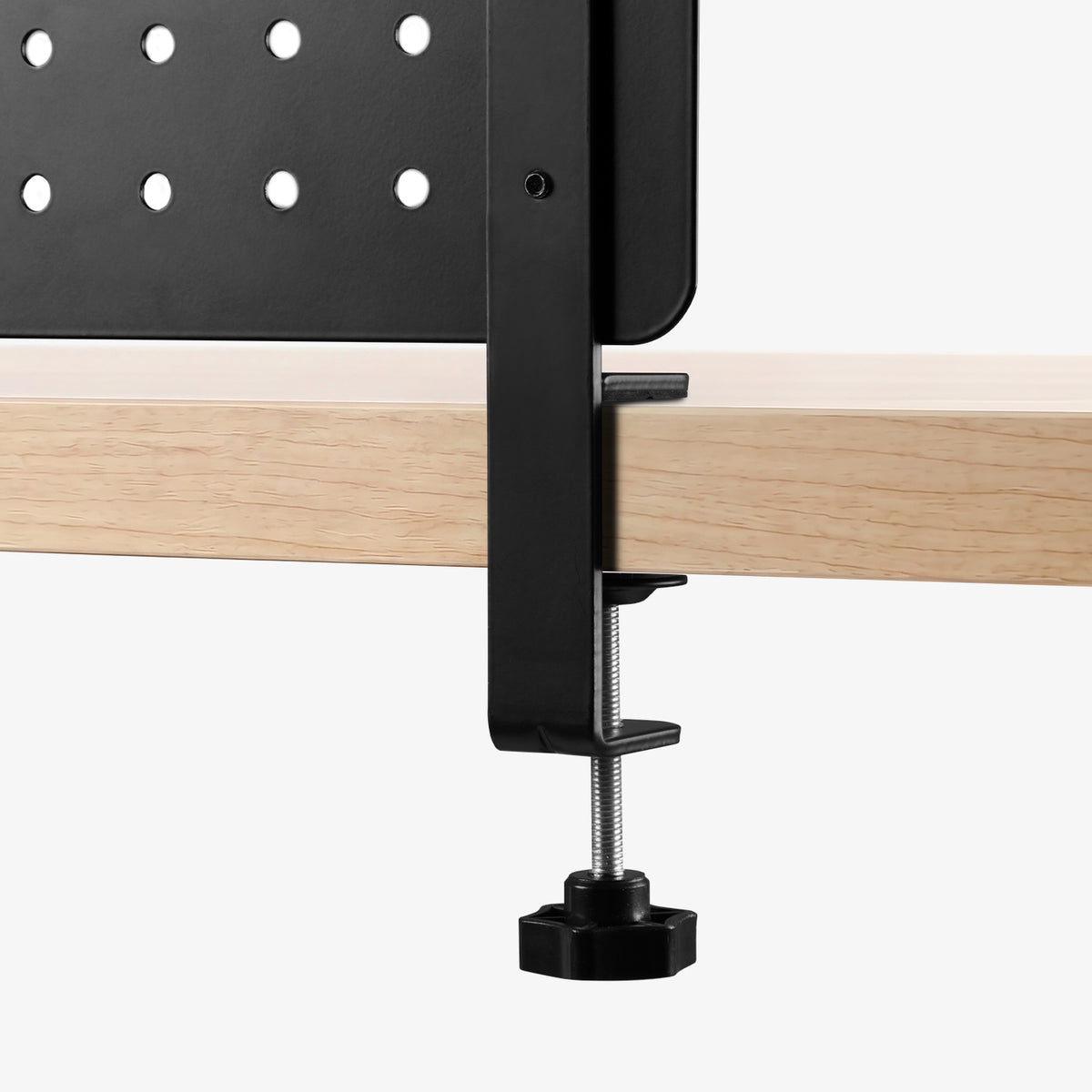 AHP11400 - Clamp Pegboard | LD405 showing close up of clamp bracket secured to wooden desk edge with pegboard panel above and star knob below