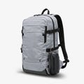 ACS09444 - [LF520] Universal Sunglass Case in Black showing the hard-shell case attached to the side of a gray backpack using a metal carabiner for convenient carry.