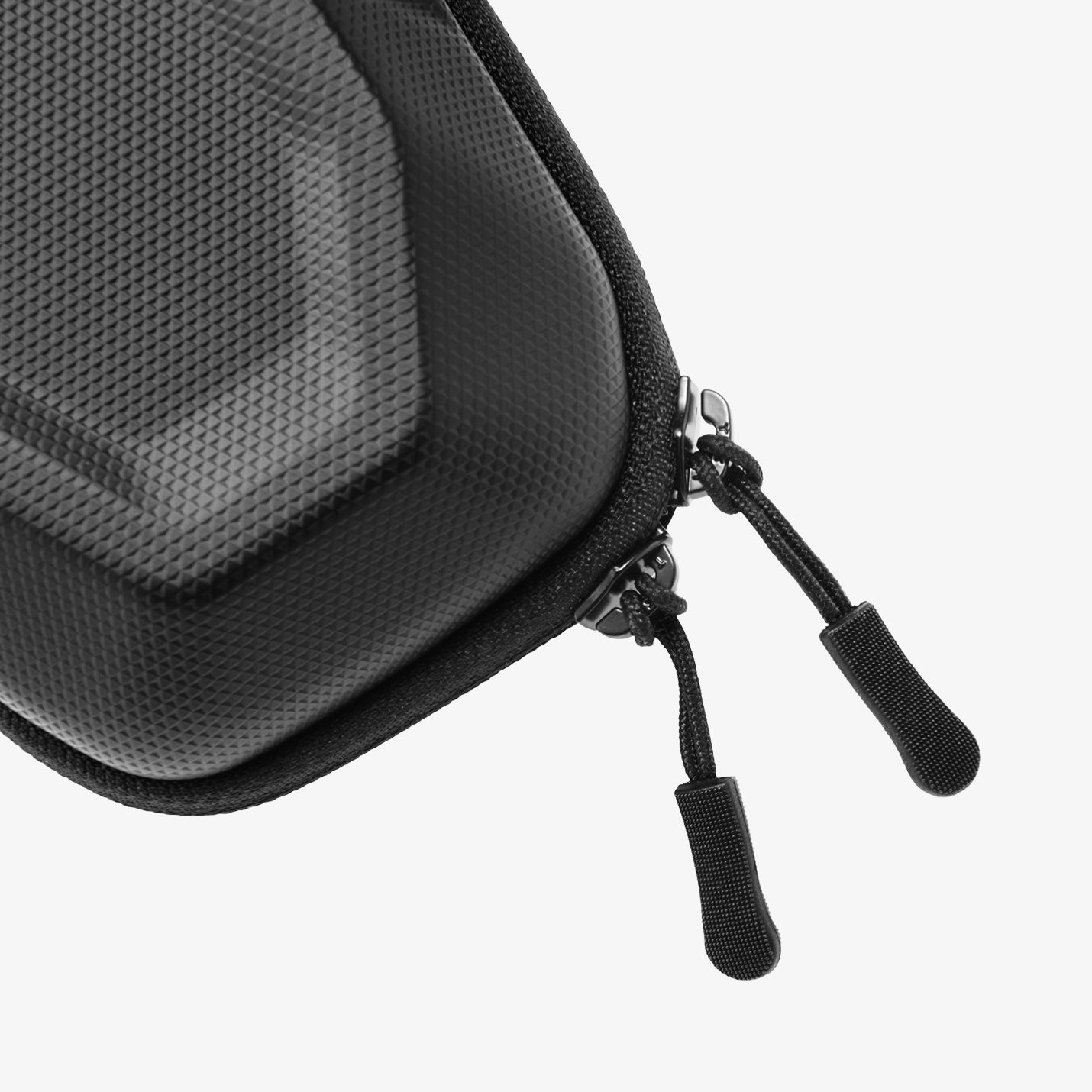 ACS09444 - [LF520] Universal Sunglass Case in Black showing a close-up of the textured hard-shell surface with dual zipper pulls and reinforced zipper track for smooth access.