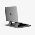 AFA06424 - MacBook Pro 16-inch Valentinus S Laptop Pouch in City Gray built in stand supporting laptop at elevated typing angle