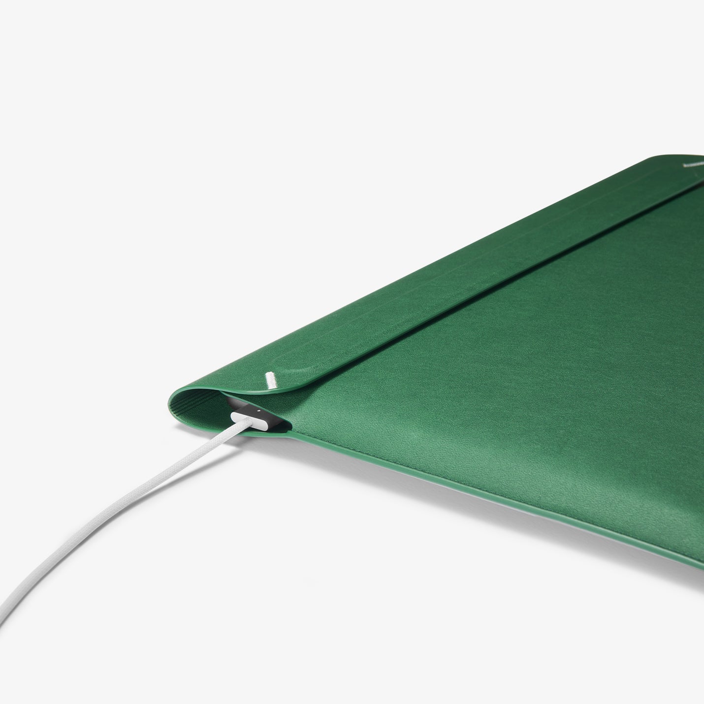 AFA06426 - MacBook Pro 16-inch Valentinus S Laptop Pouch in Jeju Green side cutout design allowing laptop charging while inside sleeve