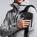 AMP09122 - Mag Fit Clip in black showing attach on the bag.