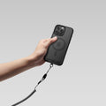AMP09122 - Mag Fit Clip in black showing back part and grip with the hand.