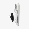 AFA08888 - Ultra Hybrid MagFit+ Wallet (MagFit) in Crystal Clear showing the side of the mag-ring hovering in front of the wallet case attached to a device showing partial sides