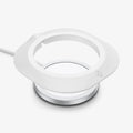 AMP02563 - MagFit in white showing the front and side with station hovering above the magsafe charger