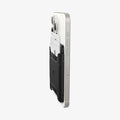 AFA07150 - MagSafe 3 Card Holder Rugged Armor (MagFit) in Black showing the partial back and side of a card holder with 3 cards inserted and attached to a device