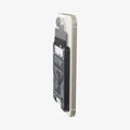 AFA07400 - Ultra Hybrid Zero One MagFit Wallet (MagFit) in Zero One showing the partial front and sides with cards inserted, attached to a device showing partial back and side