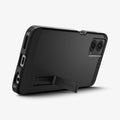 ACS07767 - Moto G 5G (2024) Case Tough Armor in Black showing the back, partial bottom with a built-in kickstand propped up