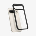 ACS07690 - Pixel 9 Pro Case Ultra Hybrid in Matte Black showing the back, partial side hovering in front of the device