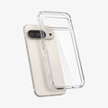 ACS07687 - Pixel 9 Pro Case Ultra Hybrid in Crystal Clear showing the back, partial side hovering in front of the device