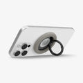AMP09032 - MagSafe Phone Holder Nano Pop (MagFit) in Truffle Gray showing the front of the phone holder, ring propped up as a stand attached to the back of the device