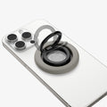 AMP09032 - MagSafe Phone Holder Nano Pop (MagFit) in Truffle Gray showing the front of the phone holder  and it's flexibility