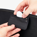AGP09077 - Nintendo Switch 2 Klasden Pouch in Charcoal Gray showing the built-in AirTag storage