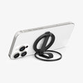 AMP08551 - O-Mag Magnetic Phone Holder (MagFit) | OM103 in Black showing the front, attached to the device propped up as a kickstand in landscape position