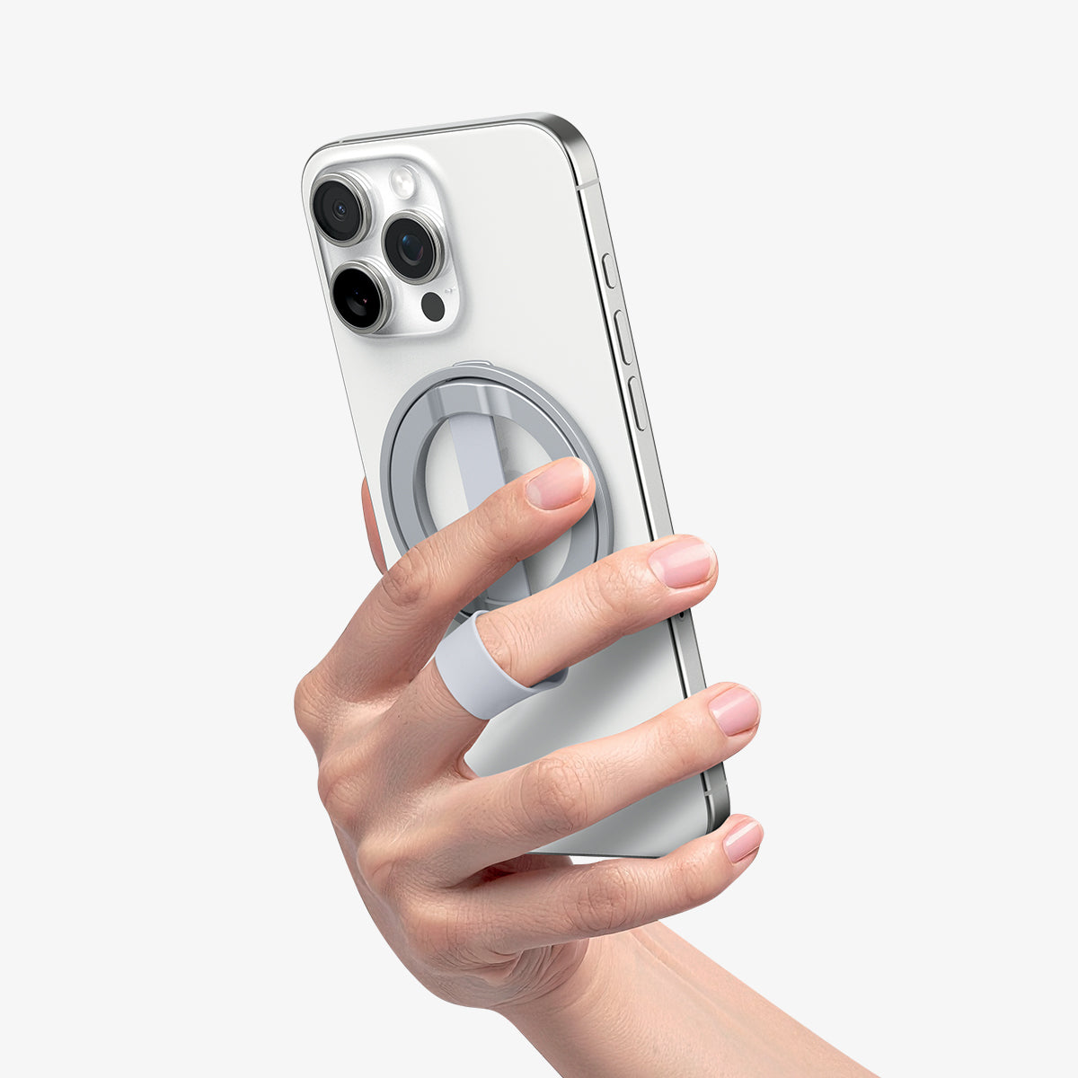AMP10193 - O-Mag Magnetic Phone Holder (MagFit) | OM103 in Sliver showing a person holding the ring holder attached to the device