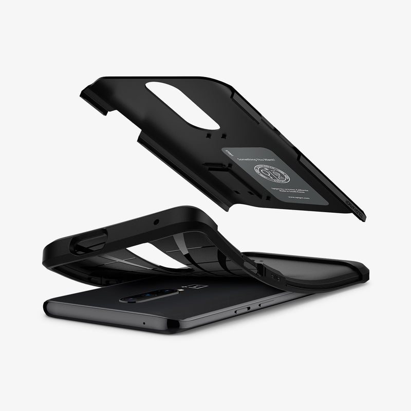 K09CS26485 - OnePlus 7 Pro Tough Armor Case in Black showing the hard layer hovering above the soft layer of the case slightly peeled off from the device