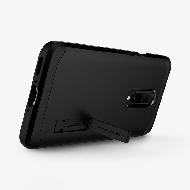 K09CS26485 - OnePlus 7 Pro Tough Armor Case in Black showing the back and partial bottom propped up by the built-in kickstand