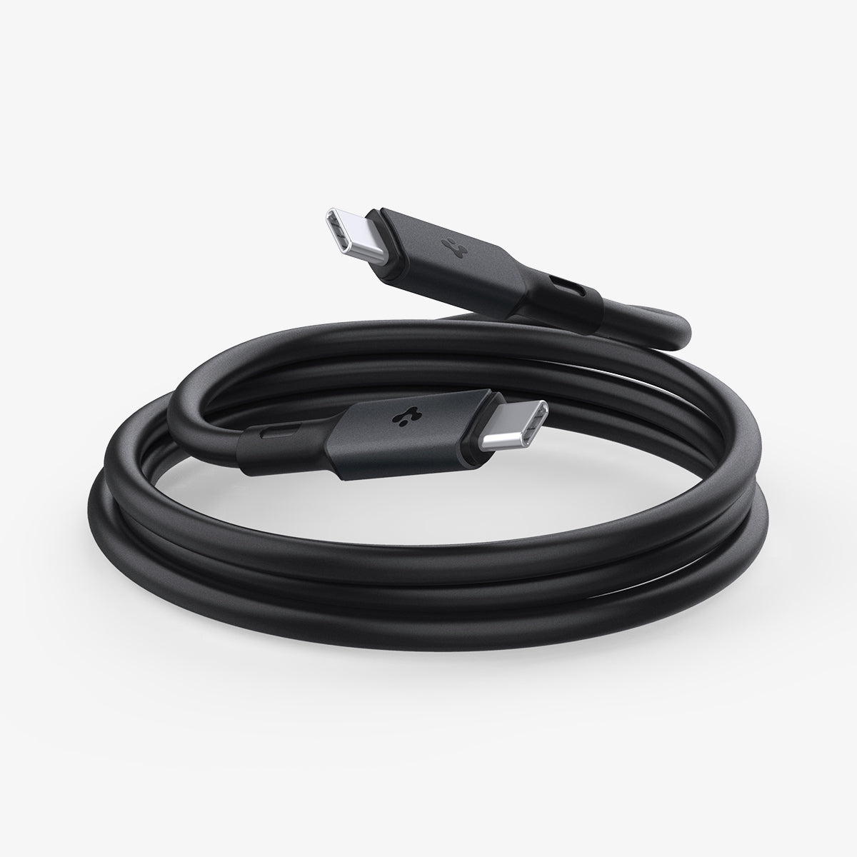 ACA06840 - ArcWire™ USB-C to USB-C Cable PB2203 in Black showing  the 2 head pins of a charger cable rolled up for storage