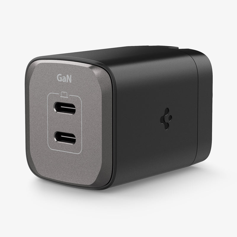 ACH05160 - ArcStation™ Pro GaN 652 Dual USB-C Wall Charger PE2204 in Midnight Black showing the top, two sides, one with the spigen logo and the other showing only partial side on a flat surface