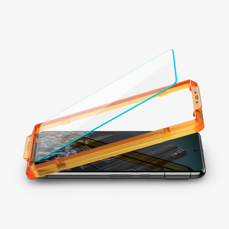 AGL07395 - Pixel 8 Pro Alignmaster in Clear showing the tempered glass partially hovering above the alignment tray and a device