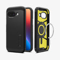 ACS09046 - Pixel 9a Case Tough Armor AI (MagFit) in Black showing the back, partial front, inner while magnet ring detached hovering in front and showing sides