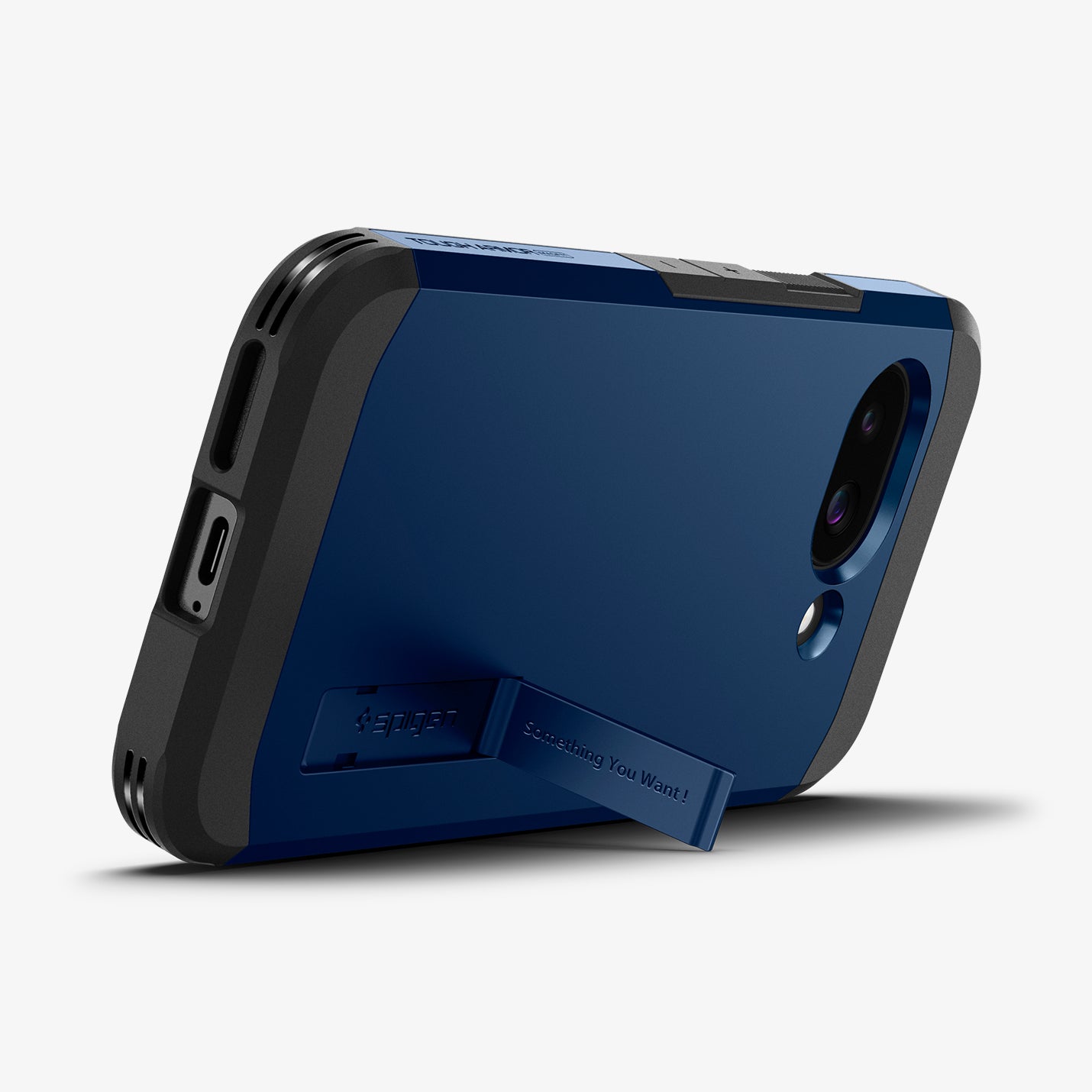 ACS09047 - Pixel 9a Case Tough Armor AI (MagFit) in Navy Blue showing the back, partial side and bottom, propped up with a built-in kickstand