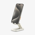 AMP07117 - Universal Phone Stand S311-1 in Dune Beige showing the front, partial side and bottom with a device attached