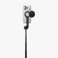 AMP11372 - Selfie Stick | S582W in Black showing an extended pole with mounted smartphone and magnetic remote attached for convenient wireless shooting.