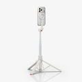 AMP11373 - Selfie Stick | S582W in Dune Beige showing a smartphone mounted on a magnetic holder with a fully extended telescopic pole and deployed tripod stand for hands-free use.