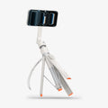 AMP11373 - Selfie Stick | S582W in Dune Beige showing a mounted smartphone in landscape orientation with an angled tripod setup and extended handle for stable hands-free shooting.