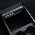 ACP07785 - Tesla Model 3 Highland Center Console Organizer Tray TO220SH in Black showing the partial edge of the tray inside a center console